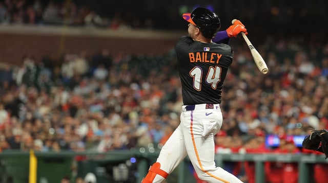 Jul 8, 2025; San Francisco, California, USA; San Francisco Giants catcher Patrick Bailey (14) hits a three-run home run against the Philadelphia Phillies during the ninth inning at Oracle Park. Mandatory Credit: Kelley L Cox-Imagn Images