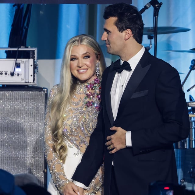 FILE - Charlie Kirk (R) and his wife Erika Lane Frantzve (L) on stage during the Turning Point USA Inaugural-Eve Ball at the Salamander Hotel on January 19, 2025 in Washington, DC. (Photo by Samuel Corum/Getty Images)