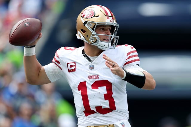 Brock Purdy #13 of the San Francisco 49ers looks to pass during the NFL 2025 game between San Francisco 49ers and Seattle Seahawks at Lumen Field on September 07, 2025 in Seattle, Washington.