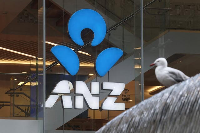 An Australia and New Zealand Banking Group Limited (ANZ) logo is displayed in a branch window in Sydney, Australia, September 9, 2025. REUTERS/Hollie Adams/File Photo