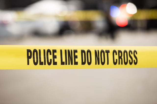 FILE: Cordon tape seals off a crime scene and establishes a police line for further investigations in Los Angeles, California, USA.