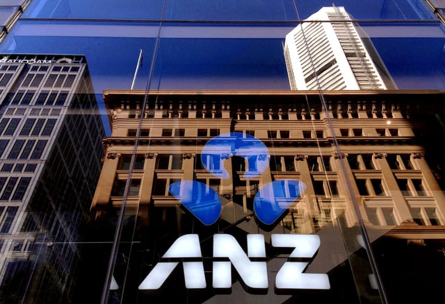 The logo of the ANZ Banking Group is displayed in the window of a newly opened branch in central Sydney, Australia, April 30, 2016. REUTERS/David Gray//File Photo