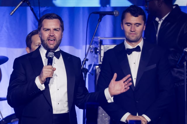 Then U.S. Vice President-elect JD Vance (C) on stage with Charlie Kirk during the Turning Point USA Inaugural-Eve Ball at the Salamander Hotel on January 19, 2025 in Washington, DC.