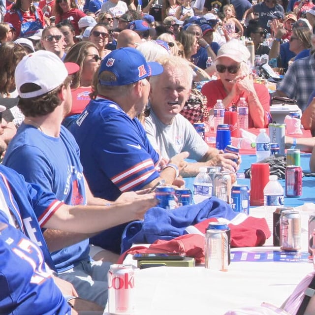 People are seen watching the Bills vs Jets game at the Bills Block Party on East Avenue, Sunday, Sept. 14, 2025. (Photo by Julia Coburn/WHAM)