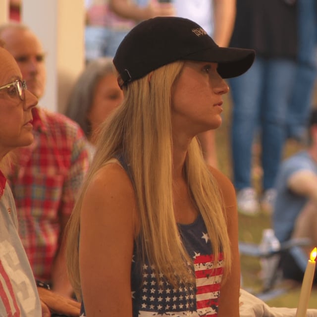 Dozens of people gathered Sunday night at Veterans Park off of Valleydale Road for a candlelight vigil to remember Charlie Kirk. (abc3340.com){p}{/p}