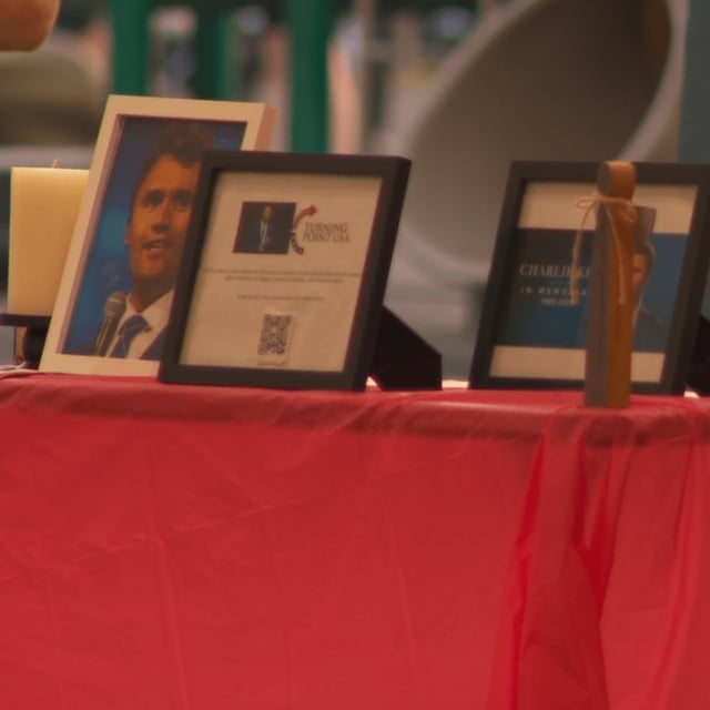 Dozens of people gathered Sunday night at Veterans Park off of Valleydale Road for a candlelight vigil to remember Charlie Kirk. (abc3340.com){p}{/p}