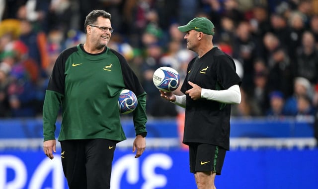 PARIS, FRANCE - OCTOBER 15: Jacques Nienaber, Head Coach of South Africa, speaks with Rassie Erasmus, Coach of South Africa, prior to the Rugby World Cup France 2023 Quarter Final match between France and South Africa at Stade de France on October 15, 2023 in Paris, France. (Photo by Mike Hewitt/Getty Images)