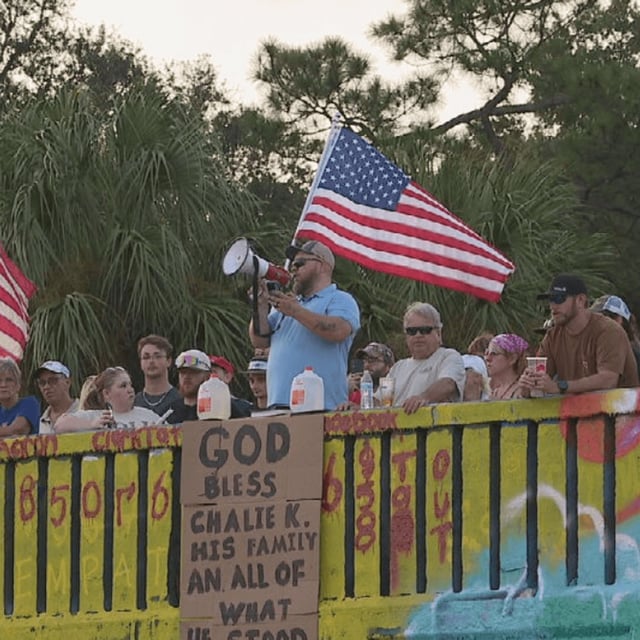 Pensacola's candlelight vigil for Charlie Kirk Sunday evening turned violent when someone attempted to spray over the Graffiti Bridge mural of the conservative activist/WEAR