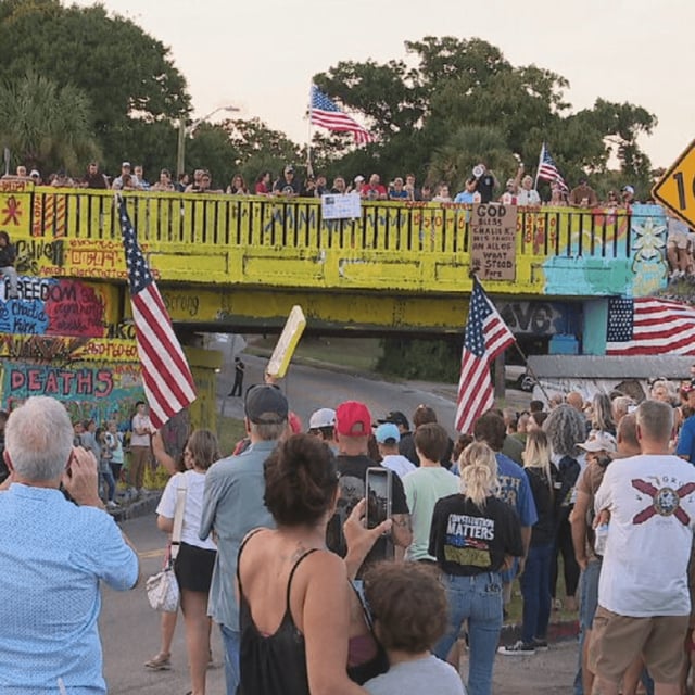 Pensacola's candlelight vigil for Charlie Kirk Sunday evening turned violent when someone attempted to spray over the Graffiti Bridge mural of the conservative activist/WEAR