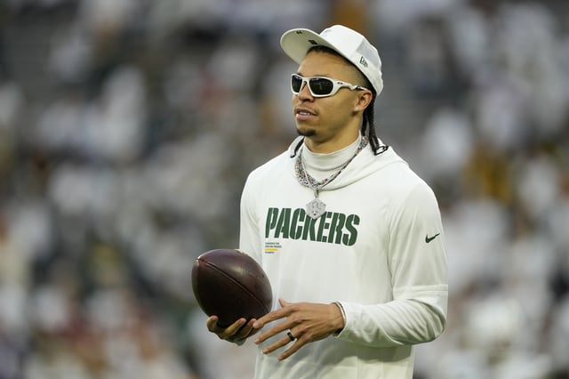 Christian Watson #9 of the Green Bay Packers looks on prior to the game against the Washington Commanders at Lambeau Field on September 11, 2025 in Green Bay, Wisconsin.