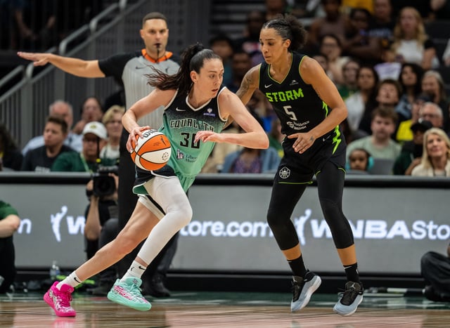 Sep 5, 2025; Seattle, Washington, USA;  New York Liberty forward Breanna Stewart (30) dribbles the ball against Seattle Storm forward Gabby Williams (5) during the second half at Climate Pledge Arena. Mandatory Credit: Stephen Brashear-Imagn Images/File Photo
