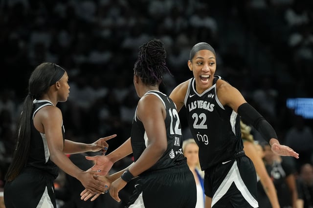 Las Vegas Aces center A'ja Wilson (22) celebrates scoring on the Seattle Storm in the third quarter during Game 1 of their 2025 WNBA Playoffs at Michelob Ultra Arena on Sunday, September 14.