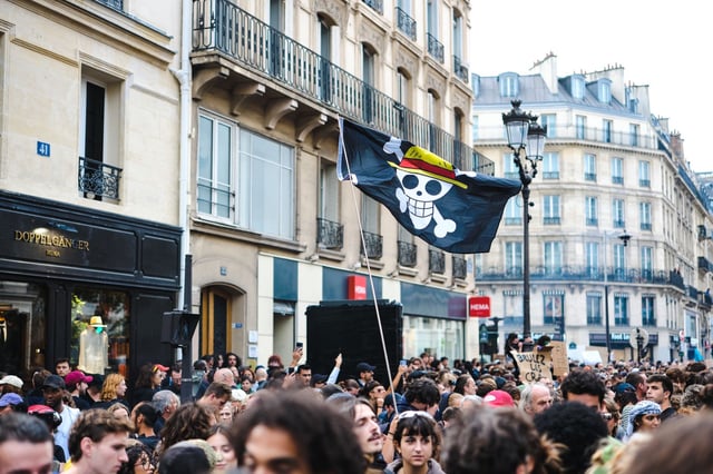 A “One Piece” flag at a “Block Everything” protest in Paris, France, on Sept. 10. (Vincent Koebel/NurPhoto via Getty Images)