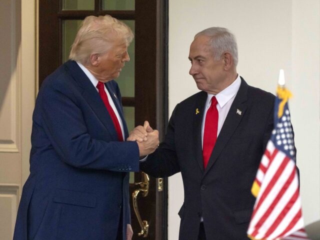 President Donald Trump, left, shakes hands with Israel's Prime Minister Benjamin Netanyahu as he leaves the West Wing of the White House, Monday, April 7, 2025, in Washington. (AP Photo/Mark Schiefelbein)