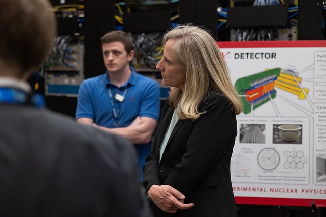 Congresswoman Abigail Spanberger listens as a speaker gives a tour of Experimental Hall D at Jefferson Lab in Newport News, Va., Sep. 5, 2024. (Lindsay Cunningham | Jefferson Lab)