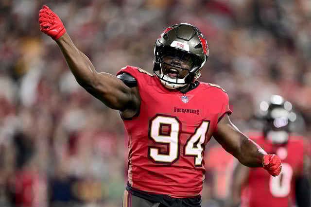 Calijah Kancey #94 of the Tampa Bay Buccaneers reacts to a play against the Washington Commanders during the first quarter in the NFC Wild Card Playoff at Raymond James Stadium on January 12, 2025 in Tampa, Florida.