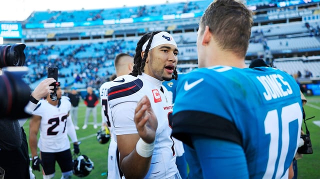 Houston Texans quarterback C.J. Stroud (7), left, talks with Jacksonville Jaguars quarterback Mac Jones (10) after the game of an NFL football matchup Sunday, Dec. 1, 2024 at EverBank Stadium in Jacksonville, Fla. The Texans held off the Jaguars 23-20. [Corey Perrine/Florida Times-Union]