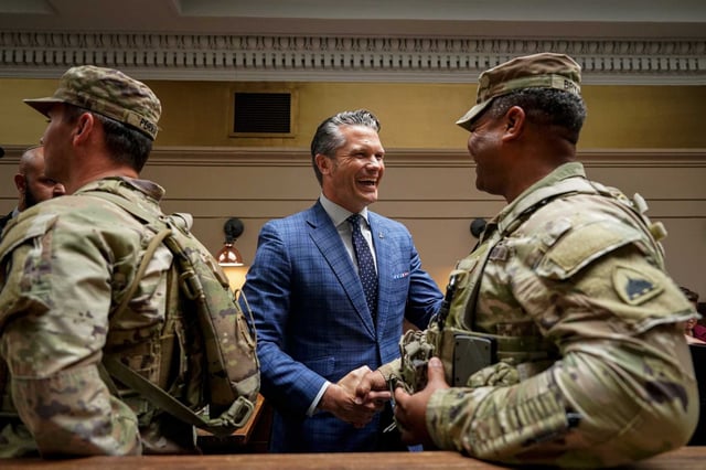 Defense Secretary Pete Hegseth, shown meeting with members of the National Guard in Washington D.C., said that cultural awareness events such as National Hispanic Heritage Month detract from unity and fighting spirit in the armed forces.