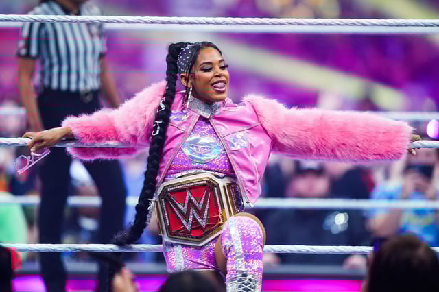 SAN ANTONIO, TEXAS - JANUARY 28: Bianca Belair is introduced prior to the Raw Women's championship during the WWE Royal Rumble event at the Alamodome on January 28, 2023 in San Antonio, Texas.