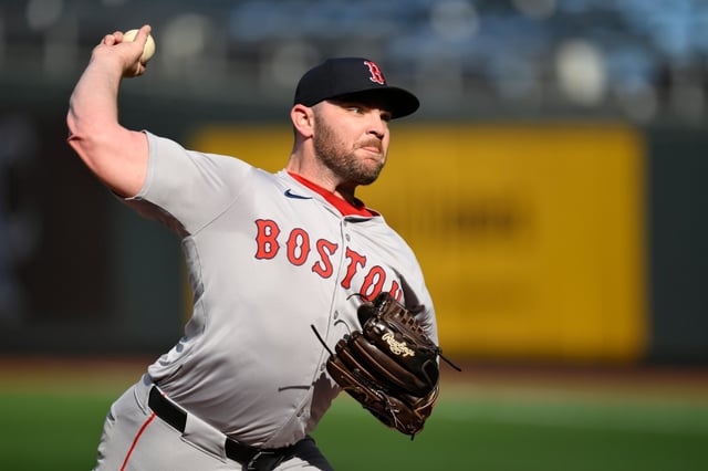 Boston Red Sox pitcher Liam Hendriks throws during warmups before a game against the Kansas City Royals, Aug. 6, 2024, in Kansas City, Mo. (AP Photo/Reed Hoffmann, File)