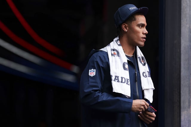 FOXBOROUGH, MASSACHUSETTS - SEPTEMBER 7: Christian Gonzalez #0 of the New England Patriots walks onto the field prior to the NFL game against the Las Vegas Raiders at Gillette Stadium on September 7, 2025 in Foxborough, Massachusetts.