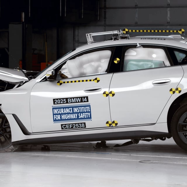 An electric vehicle is crashed in an Insurance Institute for Highway Safety test lab for a report released Tuesday, Sept. 16, 2025. The BMW i4, seen here, earned a "good" rating for the moderate overlap crash test. (IIHS)