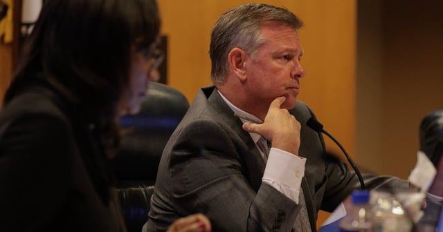 Tarrant County Judge Tim O’Hare listens to comments over the electronic pollbook system in place during a Commissioners Court meeting in Fort Worth on April 18, 2023.