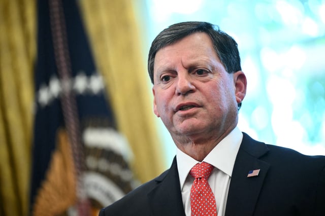 Commissioner of the Social Security Administration Frank Bisignano speaks before US President Donald Trump signs a presidential proclamation honoring the 90th anniversary of the Social Security Act in the Oval Office of the White House in Washington, DC on August 14, 2025.