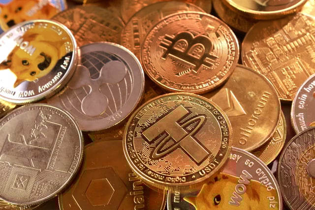 Representation of cryptocurrencies are seen in this illustration taken September 10, 2025. REUTERS/Dado Ruvic/Illustration/File Photo