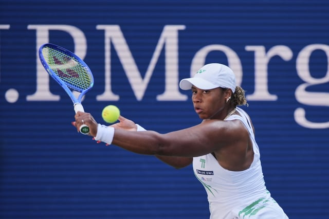 Taylor Townsend, of the United States, returns a shot against Barbora Krejcikova, of the Czech Republic, during the fourth round of the U.S. Open tennis championships in New York City on August 31, 2025.