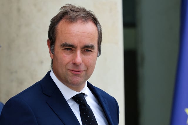 French Defence Minister Sebastien Lecornu leaves following the weekly cabinet meeting at the Elysee Palace in Paris, France, September 3, 2025. REUTERS/Gonzalo Fuentes/File Photo