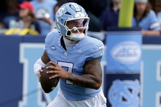 North Carolina quarterback Gio Lopez (7) looks to pass during the first half an NCAA college football game against Richmond, Saturday, Sept. 13, 2025, in Chapel Hill, N.C. (AP Photo/Chris Seward)