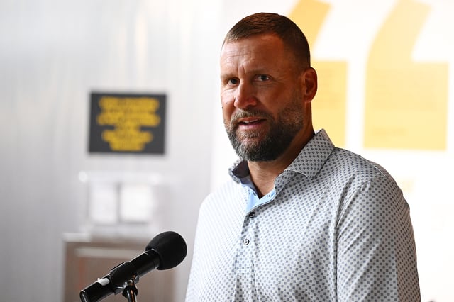 Former Pittsburgh Steelers quarterback Ben Roethlisberger unveils the new Hall of Honor exhibit prior to the NFL Preseason 2025 game between Tampa Bay Buccaneers and Pittsburgh Steelers at Acrisure Stadium on August 16, 2025 in Pittsburgh, Pennsylvania, United States.