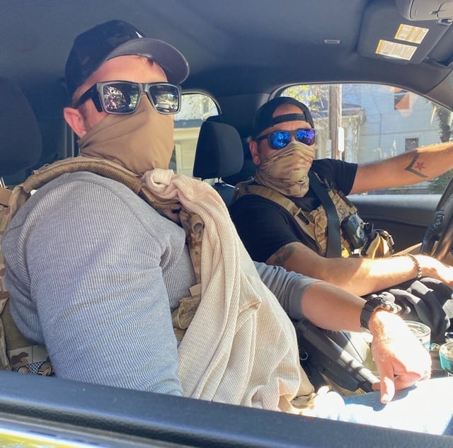 ICE agents wait inside a vehicle near North Elementary School in Waukegan Monday. ICE agents have been seen several times around the Waukegan area as part of Operation Midway Blitz to find illegal immigrants. (Courtesy of Mano a Mano)