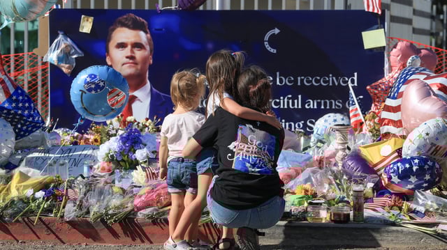 The "suspicious bag" was dropped off outside the headquarters across from a row of flowers and U.S. flags lining the curb to commemorate the death of Charlie Kirk.