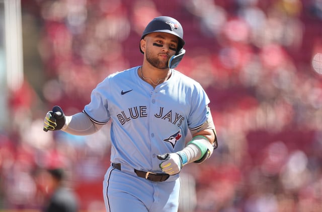 CINCINNATI, OHIO - SEPTEMBER 01: Bo Bichette #11 of the Toronto Blue Jays runs the bases after hitting a 2 RBI home run in the 9th inning against the Cincinnati Reds at Great American Ball Park on September 01, 2025 in Cincinnati, Ohio. (Photo by Andy Lyons/Getty Images)