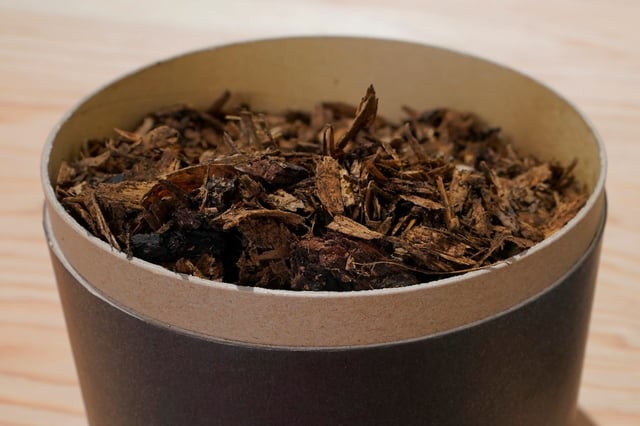 A container of compost produced from human remains is shown at Recompose, a company that composts human remains into soil, Wednesday, Sept. 15, 2021, in Kent, Wash. (AP Photo/Ted S. Warren)
