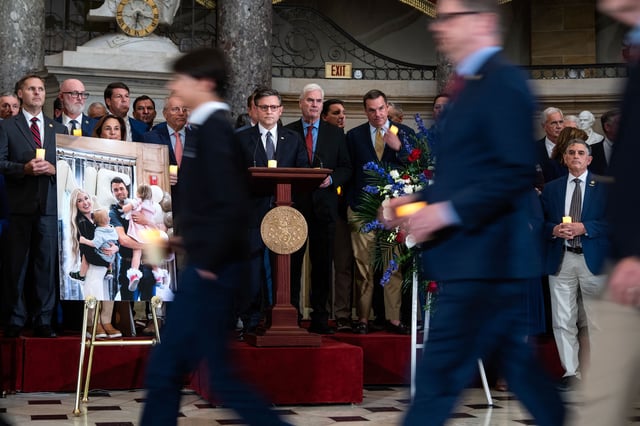 House Speaker Mike Johnson prepares for a memorial service for conservative activist Charlie Kirk in the US Capitol's Statuary Hall on September 15, 2025.