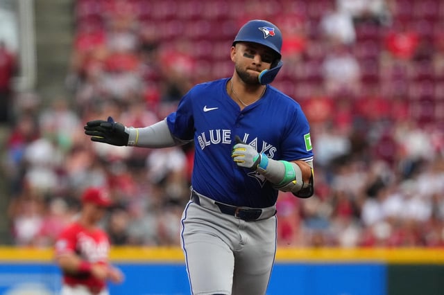 CINCINNATI, OHIO - SEPTEMBER 02: Bo Bichette #11 of the Toronto Blue Jays celebrates a three-run home run as he runs the bases during the second inning against the Cincinnati Reds at Great American Ball Park on September 02, 2025 in Cincinnati, Ohio.