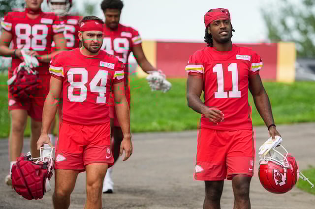 Jul 22, 2025; St. Joseph, MO, USA; Kansas City Chiefs wide receivers Mac Dalena (84) and Jalen Royals (11) walk down the hill to the practice fields during training camp at Missouri Western State University. Mandatory Credit: Denny Medley-Imagn Images/File Photo