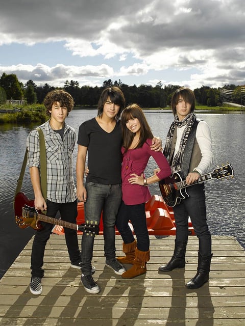  The Jonas Brothers and Demi Lovato in the original Camp Rock.