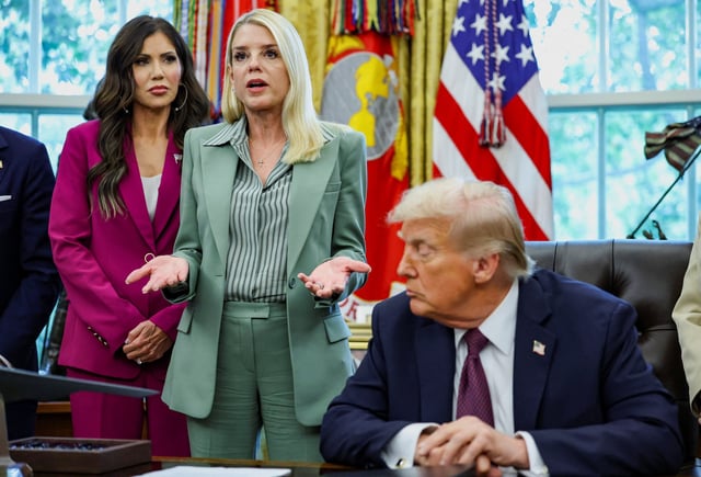 President Donald Trump listens as Attorney General Pam Bondi answers reporters' questions in the Oval Office at the White House on Sept. 15, 2025, the same day she said on a podcast that the Justice Department "will absolutely target you, go after you, if you are targeting anyone with hate speech."