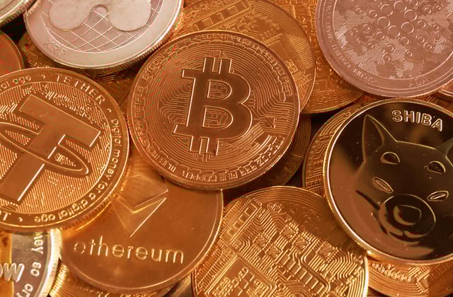 Representation of cryptocurrencies are seen in this illustration taken September 10, 2025. REUTERS/Dado Ruvic/Illustration/File Photo