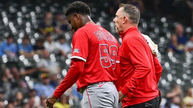 Sep 17, 2025; Milwaukee, Wisconsin, USA; Los Angeles Angels starting pitcher Jose Soriano (59) leaves the game after getting hit by a batted ball in the second inning against the Milwaukee Brewers at American Family Field. Mandatory Credit: Benny Sieu-Imagn Images