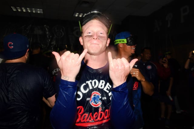 Cubs center fielder Pete Crow-Armstrong poses for a photo as he celebrates the team's 8-4 win over the Pirates to clinch a playoff spot Wednesday, Sept. 17, 2025, at PNC Park in Pittsburgh. (Nick Cammett/Getty Images)