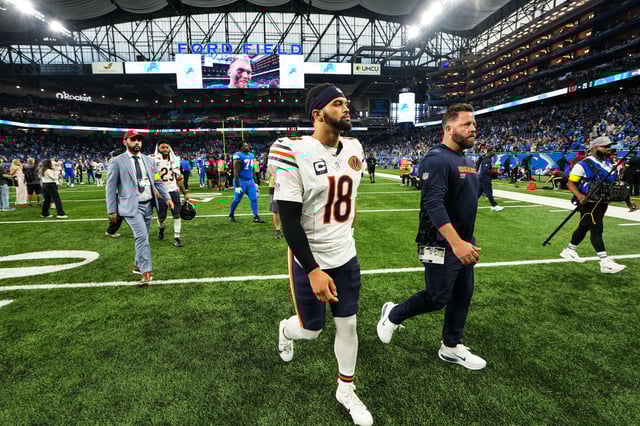 Bears quarterback Caleb Williams leaves the field after losing in Detroit on Sunday.