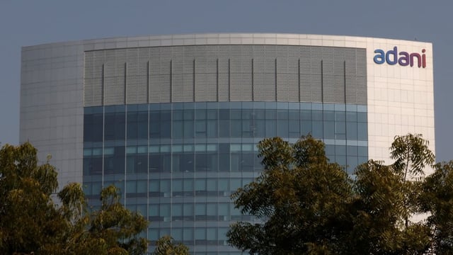 Representational | Logo of Adani Group seen on facade of its Corporate House on the outskirts of Ahmedabad | Reuters/Amit Dave