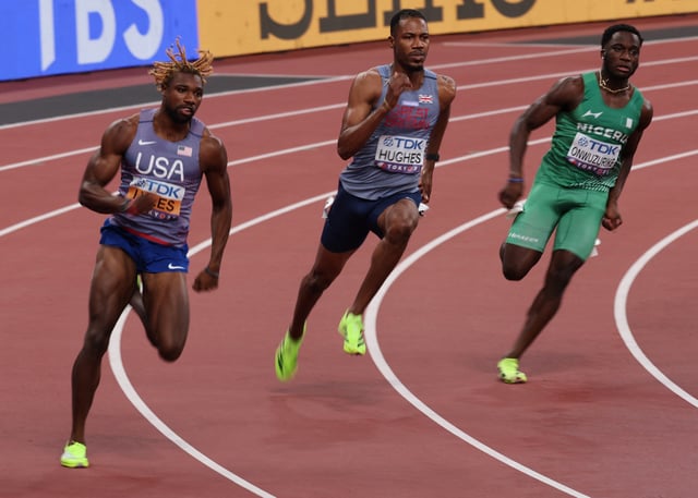 World Athletics Championships Tokyo 2025 - Men's 200m Semi-Final - Japan National Stadium, Tokyo, Japan - September 18, 2025 Noah Lyles of the U.S., Britain's Zharnel Hughes, and Nigeria's Udodi Chudi Onwuzurike in action during their heat REUTERS/Kim Kyung-Hoon