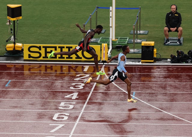 World Athletics Championships Tokyo 2025 - Men's 400m Final - Japan National Stadium, Tokyo, Japan - September 18, 2025 Botswana's Busang Collen Kebinatshipi crosses the finish line to win the final ahead of Trinidad and Tobago's Jereem Richards REUTERS/Kim Kyung-Hoon