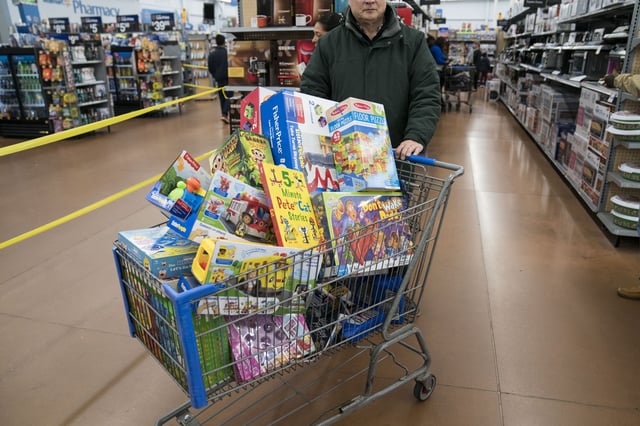 A man shops for toys in Walmart on Thanksgiving night ahead of Black Friday in King of Prussia, Pennsylvania, on November 28, 2019.